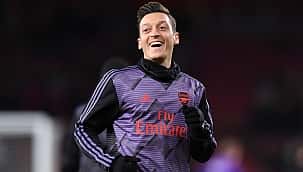 Descrição da 'transferência' de Mesut Özil