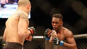 LUTA COMPLETA: Adesanya vence Whittaker e se torna campeão peso-médio do UFC